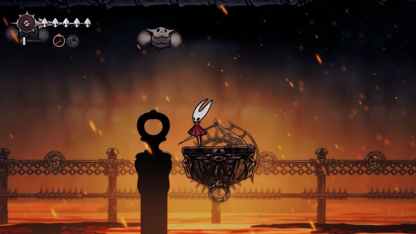 Une plateforme mobile au dessus d'un lac de lave dans Hollow Knight: Silksong